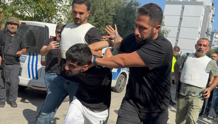 Polise el bombasıyla direndi